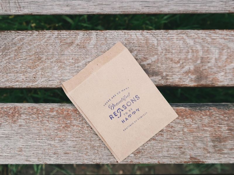 Man holding a stable plank position in a minimalist setting.